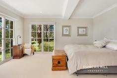 20-22 Duke St Mittagong NSW 2575 Welcome to Yarrabee, an extraordinary luxury residence that redefines the art of living well. Perched majestically atop Mount Gibraltar, this fully renovated haven offers an unparalleled executive lifestyle, harmoniously blending sophistication with the tranquillity of nature. As you step inside via a grand foyer with a vaulted ceiling, you’ll be captivated by the elegant, oversized living room with expansive views to the north. The four oversized bedrooms are all designed with comfort and elegance in mind. The master suite features a sumptuous ensuite and a large walk-in robe, promising a private retreat. At the opposite end of the house, a beautifully appointed one-bedroom apartment with a separate entry provides an ideal space for guests or a serene home office. At the heart of Yarrabee lies a large family room with a state of the art chef’s kitchen and grand butler’s pantry, seamlessly connected to a spacious laundry, making entertaining effortless and daily life a pleasure. You will be spoilt for choice when it comes to relaxing, either in the formal lounge, the spacious family room with gas fireplace, or in the cosy library/music room. Surrounded by nearly 3 acres of park-like garden, Yarrabee invites you to unwind in serene privacy. The breathtaking vistas stretch to Sydney, where you can catch a glimpse of the iconic Centrepoint Tower. And with the charming towns of Bowral and Mittagong just moments away, you can indulge in fine dining, boutique shopping, and vibrant community events while retreating to your serene sanctuary at the end of the day. Embrace a less ordinary life at Yarrabee, where luxury meets nature, and every moment is fresh air. Experience the extraordinary—your tranquil haven awaits. Features include; Gas fires in the family room and apartment Electric wall heaters in all living spaces and bedrooms Underfloor heating in all bathrooms 18-panel, 5 kW solar system Blackbutt timber floors Kitchen featuring two Miele ovens, Miele dishwasher, four cooker Miele induction cooktop, two burner ILVE gas cooktop, integrated range hood and stone bench tops Large laundry/mudroom with ample storage 5m x 4m garden shed Park-like garden that comes into its own during Spring and Autumn and includes majestic mature trees, Cherry Blossoms, and Camellias
