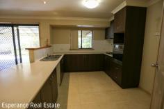 18 Gunton Circle Castletown WA 6450 Located directly across from beautiful parklands and a tranquil lake, this well-appointed 4 bedroom, 2 bathroom home offers the perfect blend of space, comfort, and convenience. Boasting three versatile living zones – including a formal lounge, expansive open-plan family area and a separate games room – there’s room for everyone to relax or entertain. Step outside and enjoy seamless outdoor living with dual access from both family living and games room to the undercover patio, ideal for year-round entertaining. Additional features include: • Double carport • Garden shed • Side access – perfect for extra vehicles or trailer storage • Generous 4 bedrooms with robes and spacious WIR to main • Kitchen with ample storage cupboards, dishwasher recess and underbench oven • Government body lease in place until November 2025, returning approx. $2,815 per month with negotiation for earlier possession possible. • Easy care 642sqm block Whether you’re looking for a rock-solid investment or a future family home in a sought-after location, this property ticks all the boxes.