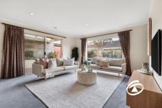 25 Kinsale View Berwick VIC 3806 $775,000 - $852,000 Exceptional Family Living Experience a home thoughtfully designed for family living, offering spacious, light-filled interiors and a seamless connection to the outdoors. From the warm and welcoming lounge with feature gas fireplace to the expansive open-plan living area, every room enjoys tranquil garden views. At the heart of the home lies a generous hostess kitchen, complete with ample bench space and extensive cabinetry—ideal for everyday use and entertaining alike. The property features four well-sized bedrooms with built-in robes, while the master suite includes a walk-in robe and a full ensuite. A family bathroom services the secondary bedrooms. Freshly painted in part and recently updated, the home is equipped with ducted heating and refrigerated cooling for year-round comfort. The sunlit courtyard integrates effortlessly with the main living areas, creating an inviting space for outdoor gatherings. Additional highlights include a double garage with rear roller door access and extra room for a trailer or additional vehicle. Nestled at the end of a quiet court, encompassed by a mature colour filled garden, close to schools, adjacent to a newly constructed wetland and the Hallam Valley walking trail, this home delivers space, comfort and convenience in a most private location.