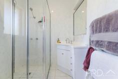 11 The Pavilion Tumut NSW 2720 $799,000 Perched high in an exclusive and quiet cul-de-sac, with elevated views of the picturesque town of Tumut and its surrounds. You will love the versatility and functionality of this well-appointed family home. Offering great diversity of living, both upstairs and down, 11 The Pavilion boasts four great sized bedrooms, multiple living rooms and rumpus area, study and a total of three bathrooms over the two levels. With additional timber decks on both levels and ample secure space for vehicles, boats or caravans. This is a central opportunity that is not to be missed. Call today to book your inspection! Premiere Features: - Four great sized bedrooms all with ducted reverse cycle air conditioning, master boasting walk in robe and ensuite - Main bathroom with separate bath and shower room and powder area positioned adjacent with separate toilet - Ensuite boasts shower, toilet and single vanity - Large centrally located entertainer's kitchen with electric cooktop, stainless appliances including dishwasher, ample cabinetry options and bench space, including display cabinetry and large island bench (boasting water, power and breakfast bar) - Free flowing open plan tiled living and dining area's directly off the kitchen, all designed to take in the picturesque surrounds and capitalise on its elevated positioning - Formal additional lounge room upstairs - Formal study upstairs with direct external deck access - Partially covered timber deck, perfect for outdoor entertaining or simply taking in the picturesque surrounds - Fourth bedroom with built-ins is located downstairs and currently used as a rumpus room - Formal rumpus with direct external access - Third bathroom positioned downstairs with shower, toilet and single vanity - Great sized laundry with external access to rear yard - Downstairs covered external entertaining - Double lockup garage with direct internal access and additional access to secure dry storage and subflooring - Secure lock up shedding with additional 2 side awnings, perfect for additional cars and or boats - Garden shedding - Ducted reverse cycle air conditioning throughout the upper level - Internal stairs - Approximate 1,016m² allotment with low maintenance manicured grounds - Walking distance to major local sporting and recreational facilities Do not miss your opportunity to secure this very versatile family home with an elevated aspect of the picturesque surrounds of Tumut.