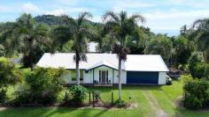 28 Cutten Street Bingil Bay QLD 4852 $490,000 A unique opportunity awaits in stunning Bingil Bay! This large, 1213 m2 corner homesite offers the perfect balance of privacy, space, and unbeatable location. Just 500 metres down the hill lies the iconic Bingil Bay Beach, with the vibrant Mission Beach tourist village-famous for its cafes and boutiques-only a scenic five-minute drive away. Bingil Bay is a breath taking haven, surrounded by World Heritage-listed rainforests like Bicton Hill National Park. Explore coral reefs just off the beach or venture 30 minutes north to the magnificent Barnard Islands in the Coral Sea. The existing home is solidly built from cement block and ready for a new owner's vision. A long, wide undercover patio (18m x 4m) runs the length of the home, facing north to capture cooling breezes. Inside, you'll find three bedrooms, a lounge/living and dining area, and one bathroom. This is a home with great bones, offering the perfect canvas for renovation and personalization. With realistic and motivated sellers, this is your chance to secure a rare piece of paradise.