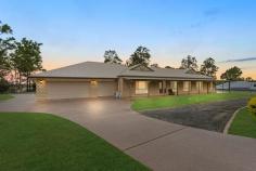 15-17 Mallard Court New Beith QLD 4124 Tucked away on a sprawling 5,000m² block in the serene enclave of New Beith, 15-17 Mallard Court is more than just a property – it’s a legacy. Owned and lovingly maintained by the same family for 19 years, this exceptional estate offers an extraordinary blend of luxury, functionality, and rural tranquility. From the moment you arrive, the sheer scale of this property is undeniable. Manicured gardens and mature shade trees frame the expansive dual-living residence, providing privacy and a sense of retreat. Built for families who cherish space and togetherness, this home has been designed to accommodate multiple generations, guests, or even provide a private space for work and leisure. Step inside, and you’re greeted by an expanse of 595m² (64 squares) of versatile living. The main residence is a masterpiece of design, with soaring high ceilings, multiple living areas, and a thoughtfully designed kitchen that is both a culinary haven and a gathering place. The kitchen is a chef’s dream, complete with a 900mm gas cooktop, a plumbed fridge, a walk-in pantry, and ample prep space. Whether it’s weeknight dinners or grand celebrations, this space is ready for it all. The living areas flow seamlessly, with a dedicated media room that is soundproof – perfect for movie nights without disturbance. For those working from home, the study offers a quiet, productive space. Meanwhile, the three king-sized bedrooms are true retreats, each offering ensuite access and private lounge spaces for ultimate relaxation. But the brilliance of this property doesn’t stop there. A fully self-contained granny flat offers independent living with two queen-sized bedrooms, a full-size kitchen, and a private living area – ideal for extended family or guests seeking their own space. Outside, the features continue to impress. A massive 4-bay shed with three-phase power and a kitchenette is a dream come true for hobbyists, while a smokehouse provides a traditional outdoor cooking experience. The 7.2 x 3m caravan or boat port, two large water tanks, and a 5kW solar power system ensure this property is not just luxurious but also highly functional and eco-friendly. Meticulously maintained, thoughtfully designed, and perfectly positioned, 15-17 Mallard Court is a rare offering that combines space, privacy, and convenience in one remarkable package. It’s more than just a house – it’s a place where memories are made, traditions are passed down, and life is lived to the fullest. Property Features: Main Residence: Massive 595m² (64 Squares) of Living Space: One of the largest homes in the area. Spacious Kitchen: Walk-in pantry, 900mm gas cooktop, plumbed fridge, generous prep space. Multiple Living Areas: Large living room, open-plan spaces, and a soundproof media room. Study/Home Office: Dedicated space for work or study. Three King-Sized Bedrooms: Bedroom 1: King-sized with ensuite and private lounge. Bedroom 2: King-sized with ensuite and private lounge. Main Bedroom 3: Extra-large with space for ultimate comfort. Six Toilets Total: Two guest powder rooms for added convenience. Huge Laundry: Includes an ironing nook and ample storage. High Ceilings Throughout: Enhancing the sense of space and elegance. Triple Remote-Controlled Garage: Secure parking with easy access. Split System Air Conditioning: Comfort in key living areas. Self-Contained Granny Flat: Two Queen-Sized Bedrooms: Both with high ceilings for added comfort. Full-Size Kitchen: Complete with an oven, stove, and plumbed fridge. Open-Plan Living and Dining: Perfect for independent living. Full Bathroom: Separate powder room for guests. Separate Utilities: Electrical switchboard, gas hot water, and phone line separate from the main house. Single Remote-Controlled Garage: Secure parking for the granny flat. Exterior & Outdoor Features: Expansive 5,000m² Block: Manicured gardens and mature trees for shade. 4-Bay Shed: Three-phase power, kitchenette, and running water – ideal for hobbies or a workshop. Smokehouse: Traditional outdoor cooking experience. 7.2 x 3m Caravan or Boat Port: Perfect for recreational vehicles. Two Large Water Tanks: 11,000L and 32,000L capacity with a trickle feed system. BIO Cycle System: Eco-friendly waste management. 5kW Solar Power System: Energy-efficient living. Colorbond Roof: Durable and stylish for long-lasting protection. Pool-Ready: Power is already set up for future pool installation. Wheelchair-Friendly Pathways: Concreted pathways for easy access. Garden Shed: Additional outdoor storage space. Security Cameras: Comprehensive coverage with communication capabilities. Utilities & Water Supply: Town Water for Kitchens: Filtered for safe consumption. Tank Water for the House and Granny Flat: Ensuring a sustainable supply. Split Electrical Systems: Independent control for the main house and granny flat. Location Benefits: Serene New Beith Setting: Peaceful, private, and surrounded by nature. Close to Local Schools, Shops, and Parks: Easy access to daily essentials. Perfect for Multi-Generational Living: Flexible layout with dual-living capabilities. 15-17 Mallard Court, New Beith, is a rare find – a sprawling family estate that offers unparalleled space, privacy, and comfort. Whether you’re a large family, looking for multi-generational living, or simply want a property that offers it all, this is your dream home.
