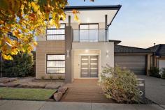 33 Adriatic Circuit Clyde VIC 3978 $730,000 - $800,000 Delivering a premium living environment where house-sized proportions compliment a large alfresco and established gardens, this contemporary retreat is a stunning testament to exceptional craftsmanship, showcasing high-quality finishes and thoughtful inclusions at every turn. Embracing its rear northern orientation, a welcoming combination of light and warmth extends across a rear social hub, where family and friends are brought together across dedicated living and dining zones, and a well-equipped kitchen featuring a walk-in pantry, dual-fuel cooker, dishwasher, and breakfast bar. Its generous layout fosters a sense of connection with two additional living zones, inviting first-floor accommodation, and a covered alfresco deck, perfect for entertaining. The master bedroom with private balcony, walk-in robe and dual-vanity ensuite anchors the three additional bedrooms, all set alongside a family bathroom with private toilet, while a guest powder room provides total practicality, below. Bringing a sense of luxury with custom sheer curtains and plush carpet, the home includes gas ducted heating, split-system heating/cooling, a dedicated laundry, garden shed, and a double garage with internal access. Centrally positioned to maximise convenience to everyday amenities, where Ramlegh Park Primary School, Clyde Creek Primary School, Clyde Secondary College, and Cranbourne's major retail all just moments from home.