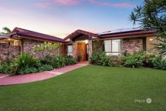 19 Greenways Esplanade Parkinson QLD 4115 An extraordinary offering packed with lifestyle appeal, this is a home like no other — and it’s perfectly suited to the large or growing family craving space, flexibility, and an unmatched outdoor lifestyle. Directly opposite the Greenways Esplanade Parklands — a sprawling recreational paradise — this home sits in one of the area’s most lifestyle-rich positions. With basketball courts, pickleball courts, BBQ areas, undercover party spaces, a BMX track, off-leash dog park, and acres of open green space, it’s a haven for kids, pets, picnics, ball games, and those peaceful sunset walks — all just across the road, and all yours to enjoy forever. Back at home, the lifestyle continues in full swing with a genuine Bali Hut, a large second outdoor patio, and both spaces beautifully framing a sparkling inground pool — shaded, private, and ready for poolside entertaining all year round. This expansive lowset residence is a substantial, well-appointed home offering five bedrooms, two bathrooms, three generous internal living areas, and multiple outdoor zones. It’s designed with family, entertaining, and comfort in mind. At the heart of the home is the entertainer’s kitchen, a central space to create and connect — featuring granite benchtops, loads of storage, a walk-in pantry, and a convenient servery window straight out to the patio, perfect for hosting while keeping an eye on the kids swimming in peace and privacy. Off the kitchen, a tiled meals and family area welcomes casual family gatherings, while a separate lounge offers a cozy retreat that’s still close by for connection. For even more versatility, a dedicated rumpus or children’s retreat sits beside two bedrooms — ideal for play, noise, and kids’ downtime — while a fully-equipped media room provides the ultimate home entertainment zone for movies, music, or multi-purpose living. The master suite, privately positioned at the rear, is a true sanctuary overlooking the pool and complete with a walk-in robe and ensuite featuring an oversized spa bath for that at-home day spa experience. Meanwhile, the additional bedrooms are spaced out for comfort and functionality, all connected by extra-wide hallways that add a feeling of space and ease — perfect for those busy household mornings. Step outside, and the leisure continues: – A larger-than-average patio – Private BBQ zone – Sparkling inground pool tucked away from neighbours – And of course, that super cool Bali Hut that truly sets this outdoor setting apart. You’ll also enjoy the comfort of having a large solar power system, ducted air-conditioning, ceiling fans throughout, full security screens, and complete fencing — making it safe for kids and pets alike. As if that wasn’t enough, this family retreat sits proudly on a level 833m² block with over 24m frontage, offering side access for boats, caravans or trailers. Even more compelling is the future potential — the property is not encumbered, providing the opportunity (subject to council approval) to subdivide into two separate lots when the time is right. And yes — it’s within the ever-popular Stretton College catchment, further underlining its value and long-term appeal. A true lifestyle home. A brilliant investment. And the space your family has been waiting for.
