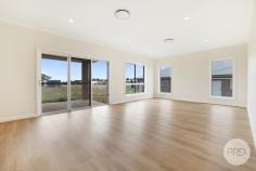 43 Kestral Street Tamworth NSW 2340 This brand new, modern family home offers space and functionality in a prime location, making it the perfect place to call home. Boasting a flowing floor plan, with loads of natural light, a well-appointed kitchen including a walk-in pantry and an open plan living and dining area. Featuring plenty of storage throughout with an additional media room and four generous-sized bedrooms, each complete with built-in wardrobes and ceiling fans with the master bedroom encompassing an ensuite and walk-in wardrobe. Other features include a convenient three-way main bathroom, ducted reverse cycle air conditioning throughout, a double lock up garage, a rainwater tank and an alfresco area for all your entertaining needs. Situated on a large 1,059sqm block in Moore Creek Gardens, this property is close to schools, parks, health services and just moments from the CBD.