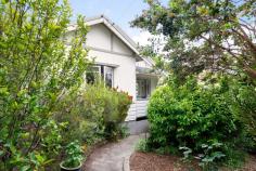 1 Neale Street Katoomba NSW 2780 $940,000 - $970,000 Nestled in the heart of the World Heritage listed Blue Mountains and just 350 metres from the vibrant heart of Katoomba, this enchanting 3-bedroom character cottage offers the ultimate retreat from the everyday. Brimming with timeless charm and natural light, this lovingly restored home blends vintage elegance with modern comforts, the perfect escape for those seeking serenity and style. From its striking timber fretwork to the glow of original Baltic timber floors underfoot, every detail tells a story. High ceilings, antique light fittings, and a cozy slow-combustion fireplace invite you to unwind in warmth and comfort. The country-style kitchen retains its original wood-burning stove, offering a delightful nod to the past alongside modern functionality. Step outside to discover lush, cool-climate gardens enveloping the home in complete privacy, while the north-facing living room opens to an inviting alfresco deck, perfect for quiet mornings or relaxed entertaining. Adding to the allure is a Japanese-inspired studio space, a peaceful haven for creativity and recreation. With dual access from both Neale Street and Hindman Street, and convenient off-street parking, this unique property truly offers flexibility, charm, and location in equal measure. Whether you're seeking a character-filled permanent residence, a stylish weekender, or a high-appeal holiday rental, this picturesque cottage is a must-see. Property Highlights: • Beautiful period features including timber fretwork, high ceilings & Baltic timber floors - Circa 1930's • Flooded with natural light through picturesque character windows • Slow-combustion fireplace and natural gas heating • Charming country kitchen with original wood-burning stove • Three good sized, peaceful and light-filled bedrooms • Living room flows to an alfresco entertaining deck and covered front porch • Freshly painted interiors and antique period light fixtures • Upgraded bathroom with ample storage • Garden studio and garage • Dual street access with individual driveways from Neale & Hindman Streets • R2 - Low Density Residential Zoning - BMCC • Established cool-climate gardens ensuring privacy and tranquillity • Prime location just a short stroll to Katoomba shops, cafés, Echo Point & walking trails • Inspections highly recommended - your mountain sanctuary awaits.