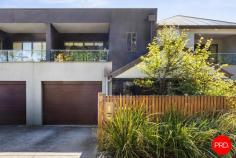 58A Hargreaves Street Bendigo VIC 3550 $550,000 - $600,000 Perfectly positioned just moments from the Bendigo CBD, Lake Weeroona, and hospital precinct, 58A Hargreaves Street presents a rare opportunity to secure a stylish, low-maintenance townhouse in a tightly held and highly sought-after location. Spanning two light-filled levels, this beautifully presented property offers 2 spacious bedrooms, each with access to its own private balcony - a perfect spot to enjoy your morning coffee or unwind with views of the leafy streetscape. The master suite boasts a walk-in robe and private ensuite, while the second bedroom is serviced by a modern central bathroom with a full-sized bath and contemporary finishes. Downstairs, the open-plan layout is both functional and inviting. The sleek kitchen comes complete with quality appliances, ample storage, and a generous island bench that flows seamlessly to the dining and living areas. Glass doors open out to a private paved patio, ideal for entertaining or simply enjoying the sunshine. Additional features include: • One secure garage space with internal access • One additional open car space • Split system heating and cooling • Downstairs powder room and under-stair storage • Stylish and neutral décor throughout Whether you're a first home buyer, medical professional, savvy investor, or looking to downsize without compromise, this residence offers unbeatable convenience, style, and comfort. Location highlights: • Minutes to Bendigo Health and the hospital precinct • Walking distance to the CBD, Lake Weeroona, cafes, shops, and public transport • Easy access to local parks, schools, and amenities Don't miss your chance to own a quality home in one of Bendigo's best positions.