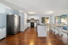 8/9 Ferry Place Gordon ACT 2906 $549,000 Perfectly positioned at the end of a quiet cul-de-sac in a friendly and well-maintained complex, this delightful single-storey, two-bedroom townhouse offers an ideal lifestyle for first home buyers, downsizers, or small families. With great neighbours and a strong sense of community, this home is a rare find in the sought-after suburb of Gordon. Set on a flat block and surrounded by leafy native trees with a picturesque mountainous backdrop, you'll feel an instant sense of calm and belonging as you approach. A charming low maintenance front courtyard with space for an additional car and trailer, framed by established trees provides a welcoming entrance and a peaceful spot to relax. With a 6.6kw solar system that provides ample amount of power for the house resulting in very low to no power bills. The house also includes a large heat pump hot water system providing consistent, reliable and green hot water to the property. Inside, the home is filled with natural light thanks to floor-to-ceiling windows in the open-plan living, dining, and kitchen area. Beautiful timber flooring flows throughout, creating a warm and cohesive space that's perfect for everyday living and entertaining. The kitchen has been tastefully updated and features ample storage, a gas cooktop, dishwasher, and stylish finishes to suit modern tastes. Both bedrooms are generously sized and include built-in wardrobes, while the centrally located bathroom offers a full-sized bath and a separate toilet for added convenience. The home includes a split system air conditioner and fans in each bedroom for year-round comfort. The laundry includes storage and has direct access to the rear yard. The dining room offers direct access to a spacious, covered outdoor entertaining area, while the backyard-reminiscent of those found in new builds-wraps around the rear of the home, creating multiple zones for entertaining, relaxing, and play. There's a grassy area perfect for kids or pets, and ample room for gardeners to create something special with flowers, shrubs, or veggie patches. This peaceful location is also incredibly practical - just a short stroll to the much-loved Gordon Adventure Playground and the nearby oval, perfect for weekend cricket or footy. Local bike paths wind through the area, giving kids and adults alike the chance to explore the outdoors safely. During the festive season, enjoy the magical view of Gordon Hill lit up in Christmas lights from your very own backyard. Conveniently located only minutes from Lanyon Marketplace and a short drive to Southpoint Tuggeranong, everything you need is right at your fingertips. Property details (approx.): Block: 340 sqm Living: 87.90 sqm Garage: 21.71 sqm EER: 2.5 Rates: $510 pq Land Tax: $877 pq Body Corp: $621.79 pq (sinking fund included) Built: 1991 Close proximity to: Gordon Primary St Clare of Assisi Primary Lanyon High School MacKillop College Lanyon Marketplace Canberra Hospital