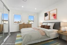 3/15 Bellambi Street Tarrawanna NSW 2518 $1,050,000 - $1,150,000 Perfectly positioned in the heart of Tarrawanna, this three-bedroom townhouse offers easy access to Corrimal Village, local schools, leafy parks and public transport. The open-plan living and dining area is tiled for practicality and flows seamlessly to a private, north-facing courtyard-ideal for quiet morning coffees or Friday night drinks under the stars. The modern kitchen is the heart of the home, fitted with stone benchtops, a gas cooktop and generous storage. Upstairs, three large bedrooms each feature built-in robes, with the primary suite featuring an ensuite and double sink. A dedicated study nook offers a quiet corner to focus, main bathroom with bathtub and extra powder room downstairs. Every detail has been carefully considered from ducted air-conditioning and secure internal access to a double garage, a water tank, and security screens for added peace of mind. Whether you're starting out, slowing down, or seeking a low-maintenance lifestyle with room to grow, this modern townhouse is ready to welcome you home. Modern townhouse, low-maintenance living Large primary suite complete with ensuite, double sink Three carpeted large bedrooms all with built-in-wardrobes Tiled living and dining area, private courtyard Double-garage with internal access, ducted a/c