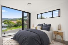 9 Attunga Street Keiraville NSW 2500 Nestled within a picturesque escarpment setting, this brand-new Torrens title duplex makes an impressive statement in style, comfort and convenience. Spanning two thoughtfully designed levels, this suburban sanctuary immediately captivates with its modern facade and impeccable finishes. Inside, the generous open-plan is enhanced by timber flooring, ducted air conditioning, and an abundance of natural light. At the heart of the home, the Scandi-inspired kitchen is a true standout. Designed for both style and functionality, it features sleek oak joinery, high-end Fisher & Paykel appliances, stone benchtops, and gas cooking. Step outside into your outdoor oasis, where a paved courtyard flows into a leafy garden just waiting to be transformed with the right dose of creativity and ingenuity. Whether you're hosting a lively weekend barbecue, exercising your green thumb or simply basking in the sunshine, this fully-fenced space offers endless possibilities. With just one common wall, this home provides a rare sense of privacy, giving you the feeling of a standalone residence where peace and quiet are the ultimate indulgence. Perfectly positioned for blue-chip convenience, this enviable address places you within easy reach of Gipps Road's vibrant café and shopping precinct, the tranquil Botanic Gardens, the University of Wollongong, and Beaton Park Leisure Centre. Modern facade, low-maintenance landscaping Escarpment views, close to Keiraville village Three bedrooms, courtyard, modern kitchen Ducted a/c, timber floorboards, lock-up garage Neutral interiors ready for your personal touch