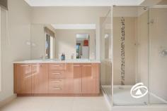 4 Chamberlain St Cranbourne East VIC 3977 $825,000 - $875,000 Room for the Whole Family? You Bet! Flawlessly presented and thoughtfully designed for comfort and convenience, this impressive residence is set on a generous 676m² (approx.) allotment with side access, nestled in a quiet, family-friendly street. Created with the modern family in mind, the flexible open-plan layout offers three separate living zones, providing ample space for everyone to relax, work, or play. Accommodation includes four well-appointed bedrooms, with the master suite featuring a walk-in wardrobe and private ensuite. The additional bedrooms include built-in robes and share a stylish central bathroom. At the heart of the home, the modern kitchen overlooks the spacious family and dining areas, flowing seamlessly to the large covered alfresco, ideal for year-round entertaining. Additional features include ducted heating and evaporative cooling for year-round comfort, a double-car garage, perfectly positioned in a sought-after pocket of Cranbourne East, with schools, shops, parks, and public transport all just moments away — this is the home you’ve been waiting for!