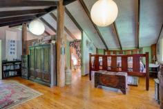 265 Jackson Road Shell Pocket QLD 4855 $750,000 "Rum Jungle" as it's affectionately named, is a secluded, yet not remote rainforest hideaway just 20 minutes from the tropical paradise of Mission Beach. Approximately 4 acres of this 8 acre (3.35 ha) property is cleared to form lush tropical gardens, lawns and a 2 story home, freestanding extra bedroom/office, pool, garaging for 5 vehicles and an authentic Balinese hut. Access is via a bitumen rural road and a good all weather gravel road through tunnels of lush rainforest. Cairns Domestic and International Airport is 90 minutes north along National Highway 1. Within a radius of 10 - 20 mins travel there are the following amenities: The El Arish Tavern, Roadhouse (under construction), beautiful golf course, 14 km coastal strip of Mission Beach with its Clump Point Boating Harbour and 12 tropical islands (including Dunk and Bedarra), coral reefs, Post Office and Shops. "Rum Jungle "is off grid with the latest (6-month-old) 9 KVA solar system including battery storage plus a 5 KVA system with its own battery storage as well ...all sufficient to power air conditioning, washing machine, pool pump, power tools etc Other features of this remarkable property include: - Freehold acreage with estimated 300-400 m of permanent creek frontage( Maria Creek) and frontage to State Forest. - 20 - 30 mins to doctors, hospitals and services (in Mission Beach, Tully or Innisfail) -The major provincial town Innisfail is approx.. 40 minutes to the north and Tully approx. 20 mins to the south - Exotic all timber and steel construction of improvements - Pool side office/bedroom and sunroom - Furniture and machinery available including tractor, implements, generators, pumps, power tools and more - 6 water tanks provide more than adequate quality water from pristine Maria Creek - A selection of tropical fruit trees including clumps of delicious Cavendish Banana trees are spread throughout the property. "Rum Jungle" is a nature lovers paradise with a fascinating array of native animals including the giant Cassowary, colourful pigeons, vibrant butterflies, platypusses, wallabies and numerous bird species. Absolutely stunning neighbourhood of valleys and rainforest clad mountain ranges. Only a handful (about 6) owners share this stunningly beautiful valley, all on private small acreages. Crystal clear swimming holes and white sandy riverbanks are at your disposal to cool off. Extremely private, quiet and serene location. The Property is located on a "no through" road (Jackson Rd (North) towards the head of a spectacular valley. The access road is maintained by the local Shire Council. This property is seriously for sale as the owners have a firm commitment to buy a property interstate. It is an extremely rare find! Time to Plan your Escape! Don't Miss Out!