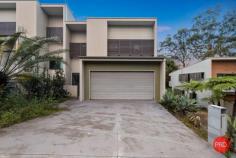 38 Summit Drive Coffs Harbour NSW 2450 $759,000 - $779,000 Set high among the treetops, this modern and well-appointed townhouse offers a peaceful retreat with the added benefit of cooling ocean breezes and lovely views of the surrounding bushland and coastline. With a practical, low-maintenance design and an inviting atmosphere, this home is ideal for buyers seeking a relaxed coastal lifestyle with everyday convenience. Inside, the open-plan living and dining area creates a spacious, light-filled environment that's perfect for both casual living and entertaining. Bamboo flooring adds a touch of warmth and character, while large sliding doors open onto a generous, covered timber deck. This outdoor space is perfect for enjoying morning coffee, hosting friends, or simply relaxing in the fresh air. The kitchen is thoughtfully positioned to connect with the main living area and features quality finishes including Caesarstone benchtops, stainless steel appliances, and a breakfast bar. It's a functional and stylish space that makes everyday cooking and entertaining easy. The air-conditioned master bedroom provides a quiet space to retreat, complete with a walk-in wardrobe and a modern ensuite with a double vanity. Two additional bathrooms-one upstairs and one on the lower level-add flexibility and comfort for families, guests, or shared living arrangements. Additional features include air-conditioning in the main living area for year-round comfort, double-glazed windows that enhance energy efficiency, and a secure double lock-up garage with remote access and internal entry. Conveniently located within walking distance of Park Beach Plaza and Homebase shopping centres, and just a short drive to several beautiful beaches, this home combines lifestyle and location. Whether you're downsizing, investing, or looking for your next home, this is a fantastic opportunity to enjoy easy living in one of the region's most sought-after areas.