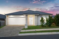 91 Mazeppa Street South Ripley QLD 4306 $839,000 Essential Details and FAQ: 214m² Home on a 400m² Block 4 Bed, 2 Bath, 2 Car 2 Living Areas Built in August 2022 by Orbit Homes Providence Estate Currently Vacant. Furniture is staged Council Rates: $697/quarter Rental Appraisal: $660/week* 2.7m Upgraded Ceilings Throughout Ducted Air Conditioning Throughout Building and Pest report available on request Welcome to 91 Mazeppa Street, South Ripley-where elevated living meets family-friendly functionality. This stylish home boasts upgraded 2.7m ceilings, ducted air-conditioning, and a light-filled open-plan living area flowing to a tiled entertaining area. With four spacious bedrooms, a media room, modern kitchen, and turfed backyard, every detail is designed for comfort. Located on a breezy 400m² block in sought-after South Ripley, this modern haven blends quality, space, and lifestyle in perfect harmony. Structural Features and Design Single-storey steel frame construction for durability and peace of mind Ducted Daikin air-conditioning throughout for year-round comfort Upgraded 2.7m ceilings enhance natural light and spaciousness Elevated position captures beautiful breezes and has lovely views over Providence from the front of the home Bedrooms and Bathrooms Four spacious bedrooms with mirrored built-ins, fans, roller blinds, ducted air-conditioning and fly screens Master suite includes walk-in robe, ensuite, and ducted air-conditioning Modern ensuite with double floating vanity, toilet, and shower Main bathroom with bath, shower, and separate toilet Kitchen and Living Areas Open-plan kitchen, living and dining flows seamlessly to tiled alfresco Oven, cooktop and range hood are all premium ILVE products Kitchen includes a 40mm island bench with 20mm waterfall edges, 6-burner gas cooktop, large 900mm oven, dishwasher, generous walk-in pantry and beautiful feature pendant lighting Sleek integrated range hood and large fridge space Soft-close mechanisms to kitchen cabinetry draws and doors Second living area/media room positioned at the front of the home Outdoors - Tiled alfresco entertaining area overlooking the yard - Fully fenced 400m² block with generous turfed backyard-ideal for kids and pets Utilities and Additional Features Separate laundry with external access NBN ready for high-speed internet Mains gas connection Location**: Zoned for Ripley Valley State School (Primary - 2 Minutes) Zoned for Ripley Valley State Secondary College (Secondary - 2 Minutes) 4 Minutes Walk to Mirrigin Park 6 Minutes to Ripley Town Centre Shopping (Coles) 16 Minutes to Springfield Train Station 18 Minutes to Ipswich Hospital 20 Minutes to RAAF Amberley 45 Minutes to Brisbane CBD Flood-Free Area Easy access to Cunningham and Centenary Highways