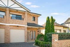 3 Daphne Avenue Bankstown NSW 2200 $1,499,950 Meticulously built this full brick four-bedroom duplex featuring a concrete suspended slab, offering both strength and style in a sought-after location. This impressive residence blends functional living with low-maintenance convenience, perfect for growing families, professionals or investors. Set on approximately 348.6m², this property showcases: Four well-appointed bedrooms, all with built-in robes Oversized master suite with robe, private ensuite and balcony Open plan living, dining and kitchen with excellent natural flow Spacious timber kitchen with breakfast bar and stainless-steel appliances Main bathroom with separate bath and shower, plus additional downstairs WC Tiled throughout on ground level, floating floors upstairs Ducted air conditioning and ample storage Large covered alfresco area, perfect for entertaining year-round Low-maintenance yard is great for the kids to enjoy Secure lock-up garage with internal access Located in a quiet family-friendly pocket close to Bankstown Central, schools, public transport and all major amenities, this is a home that offers space, quality and convenience.