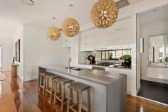 14A Belgrave Street Balmoral QLD 4171 $1,600,000 Capturing panoramic views of the city skyscrapers, this five-bedroom home boasts exquisite elevation hovering atop beautiful Balmoral. Set on a small lot with room to move, families will love the flexible floor plan, low-maintenance lifestyle and no lawns to mow. Poised to embrace the breathtaking Brisbane backdrop, abundant sunlight and flow-through breezes, the upper floor is elegantly adorned with soaring 3-metre ceilings, timber floors, large windows and louvres. Seamlessly blurring inside and out across a fluid floor plan designed for everyday comfort and entertaining, the two living areas and dual decks transition to the enclosed alfresco room and a striking stonetop kitchen showcasing a 3.2-metre island and European appliances. Five bedrooms and three bathrooms span the home, including two bathrooms with luxe bathtubs. The primary suite unveils a walk-in robe and ensuite, and all three bedrooms downstairs open outdoors. With private entry to the lower level and options to utilise the laundry as a kitchenette, you can create a dual living retreat for family or guests. Featuring Hawthorne Park 100m away, families have the ultimate backyard on their doorstep, where kids can run, play, and kick the footy just moments from home. Morningside State School and St Peter and Paul's are only footsteps from your door, bus stops are around the corner, and the CBD is 14 minutes away. With cafes, restaurants, shops, and cinemas nearby along Riding Road, Hawthorne Road, and Oxford Street, fun-filled weekends, relaxing mornings, and exciting afternoons await. Features of this property include: Elevated executive home with city views on a low-maintenance lot 5 bedrooms, 3 bathrooms, laundry, remote 2-car garage, excellent storage Upstairs primary suite featuring a walk-in robe and ensuite Interconnected living areas, alfresco room, and front and rear decks Stonetop kitchen featuring Smeg appliances and a Bosch gas cooktop Zoned ducted air-conditioning, ceiling fans, electric blinds 100m to Hawthorne Park, close to river, tennis centre and sporting clubs 250m to bus stops, 1.5km to Morningside station, 14 minutes to the CBD 400m to Morningside State School, 700m to Sts Peter and Paul's Walk to the Riding Road, Hawthorne Road and Oxford Street precincts Less than 8 minutes to Lourdes Hill College, Churchie and CHAC