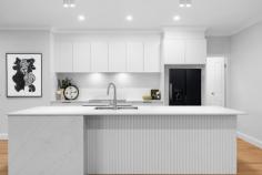 9 Amalfi Way Irymple VIC 3498 $730,000 - $803,000 Damian Portaro, Principal & Chairman's Elite Sales Agent at Ray White Mildura, proudly presents 9 Amalfi Way, Irymple, a brand-new statement of style and sophistication by Onorato Developments. Never lived in, this exceptional home delivers flawless design, premium finishes, and a level of comfort that sets a new standard for modern living. From the moment you arrive, the stunning facade, featuring striking stone elements, sets the tone for the high-end features within. Stepping through the grand timber door, a sense of space and refinement unfolds. A soaring entrance hall welcomes you, leading to expansive open-plan living areas that seamlessly connect to a beautifully landscaped alfresco. Oversized glass sliding doors create a seamless indoor-outdoor flow, perfect for entertaining. The heart of the home is the exquisite kitchen, a chef's dream with a statement stone island bench, double oven, induction cooktop, and walk-in pantry with a second sink and plumbed fridge cavity. Shaker-style 2-pac cabinetry and brushed nickel tapware complete the elegant aesthetic. The living spaces are designed for both practicality and indulgence, with a separate theatre-style lounge providing the perfect retreat for family movie nights. The master suite is an indulgent sanctuary, featuring a bespoke walk-in robe with oak-style cabinetry, integrated drawers, and shoe storage. The ensuite is designed for ultimate relaxation, with stone benchtops, a large shower, separate toilet, and floor-to-ceiling tiles. Three additional bedrooms, all with built-in robes and ceiling fans, are serviced by a beautifully appointed main bathroom with a freestanding bath. A large powder room provides an additional space to get ready, reinforcing the home's thoughtful design. Beyond the interiors, the outdoor living space is equally impressive. A massive entertaining area creates the perfect setting for all-season entertaining. The landscaped 715m² allotment offers space without excessive maintenance, while the double garage includes built-in storage and backyard access for added convenience. Positioned in one of Irymple's most prestigious locations, this home is moments from leading schools, shopping, and recreational facilities. A rare opportunity to secure a brand-new, never-lived-in luxury residence, designed for those who appreciate the finer things in life.