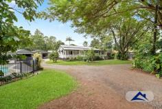 3-5 Byers Street EDMONTON QLD 4869 $1,100,000 Tucked away behind secure gates and flourishing gardens, this home offers a life rich in beauty, history, and timeless appeal. Once immortalised by celebrated artists Donald Friend and Margaret Olley, this extraordinary Byers Street residence seamlessly blends classic charm with elegant modern enhancements. From its roots as a pioneering homestead to its place in Australia's artistic legacy, it is far more than just a home, it is an extraordinary residence delivering a lifestyle of character, luxury, and comfort. Features You'll Love: • Authentic period detail - Original polished white Cowrie pine and ironbark floors, soaring tongue-and-groove ceilings, French doors throughout, and stained-glass casement windows capturing the essence of classic craftsmanship • Private and secure entrance - Hidden behind a high fence with double electric gates, the home opens to a wide spotted gum veranda and welcoming stained-glass door • Freshly updated interiors - Professionally repainted inside and out, delivering a crisp, timeless backdrop to the home's original features • Showpiece kitchen - Nordic Blue Granite benchtops imported from Norway, Smeg 1100mm cooker with 3 ovens and 7-burner gas cooktop, plus new gold hardware and tapware for a refined modern touch • Renovated Butler's Pantry - Complete with timber benchtops and farmhouse sink, offering excellent storage and prep space • Smart modern additions - A brand-new laundry and upgraded outdoor kitchen enhance daily living and entertaining • Versatile living zones - Tiled downstairs lounge with exposed timber beams, ideal as a relaxed second living area, hobby space, or quiet retreat • Private master suite - Includes dual walk-in robes, a modern ensuite framed by stained glass and timber, private mountain-view balcony, and split-system air-conditioning • Energy-smart upgrades - 6.6kW solar system with twin inverters, solar hot water, and an electric car charger • Enhanced security - Crimsafe-style screen doors on all main entries including the master bedroom, with upgraded windows with matching security screens Outdoor Features: • Lush irrigated gardens - Fruit trees, raised vegetable beds, flowering natives, and butterfly and bird-attracting plants • Two versatile 6m x 6m sheds - One includes a mezzanine; the other is configured as a treatment room or sleepout, both with high-clearance access (2.5m high x 2.65m wide) • Resort-style saltwater pool - Sparkling pool with cascading waterfall, expansive decking, a shaded entertaining gazebo, and firepit area, perfect for relaxing or entertaining This is far more than just a home, it's a living masterpiece, a rare piece of Queensland's pioneering and artistic legacy, lovingly modernised for a new era of owners. Whether you're a passionate admirer of Australian art, a lover of history, or simply searching for a home filled with soul and sophistication, this truly remarkable property is one-of-a-kind. Don't miss the chance to own a story, a sanctuary, and a slice of Far North Queensland's heritage.