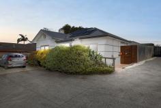 2/1154 Frankston-Flinders Road Somerville VIC 3912 $550,000 - $600,000 The perfect position where convenience meets community Radiating the classic charm of the fabulous 50s, this beautifully updated three-bedroom cottage gracefully caters to the demands of modern life. It effortlessly intertwines a touch of Art Deco elegance with a practical living experience, all nestled on the outskirts of Somerville's bustling retail centre. Tucked away in a three-lot subdivision without Body Corporate limitations, this charming home greets you with bright, sunlit interiors highlighted by the warm beauty of solid timber floors. A central hallway elegantly separates the living spaces from the entertaining areas, while the cozy crackle of an open fireplace beautifully defines the distinction between the living and dining zones. An updated kitchen with a freestanding dual-fuel cooker, dishwasher and feature circular sink ensures everyday cooking is effortless, while a rear main bathroom complements with a contemporary design. Three bedrooms, including the master, provide comfortable accommodation for family or guests, while additional features include sun-drenched deck and covered verandah, a dedicated laundry, reverse-cycle heating and cooling throughout, solar power, a rear garden shed, and two parking bays. Set within an easy walk of Somerville Plaza, Vesbar, Somerville Recreational Reserve, and Somerville Train Station.