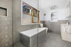 2/1154 Frankston-Flinders Road Somerville VIC 3912 $550,000 - $600,000 The perfect position where convenience meets community Radiating the classic charm of the fabulous 50s, this beautifully updated three-bedroom cottage gracefully caters to the demands of modern life. It effortlessly intertwines a touch of Art Deco elegance with a practical living experience, all nestled on the outskirts of Somerville's bustling retail centre. Tucked away in a three-lot subdivision without Body Corporate limitations, this charming home greets you with bright, sunlit interiors highlighted by the warm beauty of solid timber floors. A central hallway elegantly separates the living spaces from the entertaining areas, while the cozy crackle of an open fireplace beautifully defines the distinction between the living and dining zones. An updated kitchen with a freestanding dual-fuel cooker, dishwasher and feature circular sink ensures everyday cooking is effortless, while a rear main bathroom complements with a contemporary design. Three bedrooms, including the master, provide comfortable accommodation for family or guests, while additional features include sun-drenched deck and covered verandah, a dedicated laundry, reverse-cycle heating and cooling throughout, solar power, a rear garden shed, and two parking bays. Set within an easy walk of Somerville Plaza, Vesbar, Somerville Recreational Reserve, and Somerville Train Station.