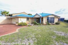 25 Walmsley Street Castletown WA 6450 $785,000 Positioned on a generous 1,013m² block and just a short 450m stroll to the sparkling shores of Castletown Beach, this well-maintained 4-bedroom, 2-bathroom brick and iron home offers space, comfort, and coastal convenience. Built in 2001, the home boasts a functional and family-friendly layout with multiple living areas, including a large open-plan kitchen, dining, and living space featuring reverse-cycle air conditioning and gas bayonet point. The timber kitchen is well-equipped with electric cooking appliances, a dishwasher, and rainwater plumbed to the sink. A formal lounge room is separated by French Doors and includes a gas wood-look tile fire that provides a cosy ambience. The master bedroom suite includes a walk-in robe and private ensuite. All minor bedrooms are generously sized and include built-in robes. The main bathroom offers a separate shower, vanity, and bathtub, complemented by a spacious laundry. Property Highlights: • Double garage with remote doors and internal access under the main roof • Side access to a large rear yard • Paved patio under the main roof – ideal for outdoor entertaining • 6m x 6m powered workshop with concrete floor and dual roller doors • Established front and rear gardens with reticulated lush lawns • Rainwater tank and water softener system Ideal for families, retirees, or anyone seeking a relaxed coastal lifestyle, this home ticks all the boxes. With room to move and grow, plus easy access to the beach, schools, and shops, it’s the perfect place to call home.