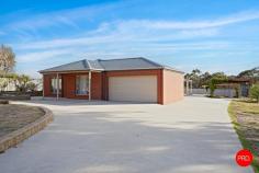 37 Union Street West Bendigo VIC 3550 $670,000 - $690,000 Tucked away in a peaceful pocket of West Bendigo, just minutes from the city centre, this immaculately presented family home offers the perfect blend of privacy, space, and convenience. Set on an expansive allotment just shy of 1,500sqm, the property boasts impressive street frontage and is fully fenced to ensure peace of mind and privacy. Inside, the home features four generously sized bedrooms-each with built-in or walk-in robes-alongside two modern bathrooms, including a private ensuite to the main suite. The thoughtful floorplan offers multiple living zones, including a bright and spacious open-plan living and dining area with a feature fireplace, a second family room ideal for kids or entertaining, and a well-appointed central kitchen with ample bench space and stainless steel appliances. Step outside and discover a large undercover alfresco area, perfect for year-round entertaining, with a securely fenced yard offering room for kids, pets, or future landscaping dreams. The oversized garage and wide concrete driveway provide abundant off-street parking, ideal for caravans, or growing families. Ideally located just 6 minutes from Bendigo CBD and close to schools, bushland walking trails, and key amenities, this property presents an outstanding lifestyle opportunity for families, upsizers, or savvy investors alike.