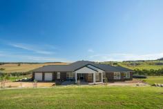 10 Moyne View Little Hartley NSW 2790 $1,595,000 - $1,745,000 Nestled in the serene valley of Little Hartley, 10 Moyne View is a rare acreage offering that perfectly combines country charm with refined contemporary living. Situated on an expansive parcel of picturesque land with direct access to Moyne Creek, this immaculately designed residence captures panoramic views of the surrounding escarpments while offering a lifestyle of comfort, privacy, and functionality. From the moment you enter through the oversized timber front door, you're greeted with a sense of scale and sophistication-highlighted by 2.57m ceilings, double-glazed windows, and a flowing open-plan layout that seamlessly connects indoor and outdoor living. Whether you're entertaining in the gourmet kitchen with its 40mm stone benchtops, dual ovens, and butler's pantry, or relaxing in the family room by the Nectre woodfire, every space has been thoughtfully curated. Four generous bedrooms include two master suites with walk-in robes and private ensuites, while additional luxuries such as a large media room, office nook, powder room, and mudroom make this home ideal for families and entertainers alike. Outside, enjoy the peaceful ambiance of an enclosed courtyard and pergola, dine alfresco under the large undercover area, or explore the orchard and dam that add to the property's rural charm. Add a 7x5m powered shed, 130kL water tank, solar panels, premium STP system, and ducted zoned heating/cooling, and you have a home that is as practical as it is beautiful. A true one-of-a-kind lifestyle escape and under two hours from Sydney. Breakdown of Features: 4 bedrooms - two with ensuites & WIRs; two with built-ins Family bathroom with freestanding bath + powder room Gourmet kitchen with butler's pantry, 2 ovens & 40mm stone benchtop Open-plan living/dining/family area with Nectre woodfire Zoned ducted heating & cooling + double glazing throughout Large media room, mudroom, laundry with built-ins & office nook Oversized solid timber doors & 2.57m ceilings throughout Enclosed courtyard with pergola + undercover alfresco 7x5m shed with 3-phase power, dam, orchard & access to Moyne Creek Solar (7kW), 130kL water tank, STP system & fully fenced with alarm
