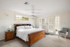 21 Bruarong Crescent Frankston South VIC 3199 $1,700,000 - $1,870,000 A distinguished Olivers Hill setting on an expansive 977sqm (approx.) allotment showcases the beauty and space of 'Narrawong', a meticulously presented four-bedroom plus bungalow residence beautifully transformed for today's modern lifestyle. Sweeping bay views that meet with Mount Dandenong reflect the prestigious nature of this generous family home, set within the Frankston High School Zone, and only a short walk from Frankston Beach. Complementing the crisp air of a winter morning, a gas log fireplace and ducted heating bring comfort to dual living zones, a light-filled dining space with attic storage, and a well-appointed stone-finished kitchen, complete with European appliances including double pyrolytic wall ovens, an induction cooktop, and a dual-drawer dishwasher. A north-facing balcony entices entertaining outside, where below, landscaped gardens cradle an alfresco deck with above-ground spa, and private bungalow with space for remote work, teenager's retreat or a service-based business (STCA). Gracefully cascading across both levels, four inviting bedrooms and two well-appointed bathrooms that promise a haven of comfort. At the heart of it all lies the lower-level master suite, where a separate parent's retreat complements a newly transformed ensuite with dual vanity, a walk-in shower, and a heated towel rail. Finalising with original leadlight detailing, timber wall panelling, ceiling fans, split-system air conditioning, a garden shed, an oversized double garage and lush landscaped gardens. Set within moments of Mount Eliza Village, Frankston Hospital, Sweetwater Creek Reserve, Bayside Shopping Centre, and public transport.