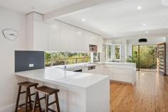 130 The Crescent Helensburgh NSW 2508 There is no better way to finish your day than sitting back on your deck, with a wine in hand and watching the sun set over the valley with your family and friends. This spacious two-level residence is designed for effortless entertaining and comfortable family living. Nestled among beautifully landscaped gardens and lush lawn areas, the home enjoys elevated positioning above the road, offering exceptional privacy and a breathtaking outlook. Key Features: • Dual Street Access: Convenient entry from both The Crescent and Old Station Road, just a short stroll from Helensburgh train station - no more parking hassles for your daily commute. There is covered off street parking on both entries. • Impressive Indoor/ Outdoor Living: The lower level boasts sun filled, open-plan living and dining with polished timber floors, flowing through glass doors to a spectacular entertaining deck overlooking the tranquil valley. At the heart of the home, the kitchen features a breakfast bar, generous storage, and extensive bench space - ideal for everyday family meals or entertaining guests. • Versatile Living Spaces: Also on the lower level are also a modern family bathroom, laundry and a dedicated study/home office. • Spacious Accommodation: Upstairs, you'll find three generous bedrooms with built-in robes, including a master suite with ensuite. A second living area offers the flexibility to convert into a fourth bedroom if desired. • Prime Location: Close to local schools, parks and walking trails. Helensburgh train station is just a short walk away for a commute of 50 minutes to the Sydney CBD and the drive to the picturesque Stanwell Park Beach is less than 10 minutes. With its blend of space, style and a spectacular setting, this exceptional home has so much to offer. To truly appreciate everything this beautiful home has to offer an inspection is a must.