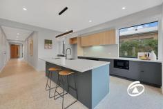 13 Lever Cct Officer South VIC 3809 $1,200,000 - $1,275,000 Pristine 6-Bedroom Burbank Ex-Display Home – Never Lived In Seize this extraordinary opportunity to secure a pristine near-new Burbank ex-display home that has never been lived in, presenting immaculate showcase quality and premium presentation throughout. This magnificent double-storey masterpiece delivers an expansive 44 squares of expertly crafted living space, perfectly positioned to capture breathtaking park vistas complete with BBQ facilities and children's playground, creating the ultimate sanctuary for large and growing families. Welcome home to six superbly appointed bedrooms, including a versatile guest room, all boasting luxurious walk-in robes for abundant storage solutions. Three stunning contemporary bathrooms plus a convenient powder room downstairs deliver effortless family living, while multiple impressive living zones create endless possibilities for every lifestyle including an elegant formal lounge, spacious family room, private upstairs retreat, and state-of-the-art dedicated home theatre. A sophisticated study provides the perfect work-from-home haven. The spectacular heart of this home features a gourmet designer kitchen with premium butler's pantry, flowing effortlessly into expansive open-plan dining and entertaining areas. Exquisite finishes include lustrous polished floor tiles, contemporary downlights, zoned ducted heating, and refreshing evaporative cooling ensuring year-round comfort and luxury. Step seamlessly outside to your impressive covered alfresco entertaining pavilion, embracing professionally manicured, low-maintenance gardens. The crowning jewel is the spectacular direct park outlook where children can enjoy endless adventures in the adjacent playground while you create cherished memories with friends and family in the park's premium BBQ facilities. Perfectly positioned in this highly sought-after excellent location within a prestigious family-oriented enclave, you'll enjoy seamless access to top-tier schools, premium shopping precincts, and efficient public transport connections. Superior freeway accessibility ensures effortless connectivity while preserving the tranquil residential ambiance that makes this location truly exceptional. As a never-lived-in display home, this remarkable property delivers outstanding value with showcase presentation and premium inclusions throughout, enabling immediate occupancy to pristine conditions that would typically require months to achieve in new construction. This isn't merely a house – it's your family's gateway to an enviable lifestyle of uncompromising space, superior quality, and effortless luxury, enhanced by spectacular parkland panoramas and world-class recreational facilities literally at your doorstep. Don't let this rare display home treasure slip away – enquire today to secure your family's future in this exceptional residence.