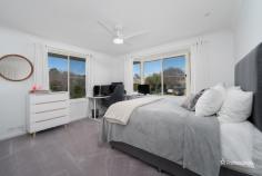87 Ash Tree Drive Armidale NSW 2350 $850,000 Welcome to 87 Ash Tree Drive, a beautifully renovated family home nestled at the end of a peaceful cul-de-sac in one of Armidale’s most sought-after neighborhoods. This spacious property, set on a generous 959-square-meter block, offers a perfect balance of modern updates and expansive indoor-outdoor living spaces. Upon entry, the ground level boasts a secure double lock-up garage with internal access, providing convenience and peace of mind. Inside, you’ll find three well-sized bedrooms, each fitted with built-in sliding wardrobes, and a home office that can easily serve as a fourth bedroom. The master suite, complete with a private ensuite, ensures a restful retreat for the heads of the household. The open-plan living and dining area, updated with elegant neutral tones and low-maintenance timber-style flooring, offers ample room for family gatherings. Large windows flood the space with natural light and provide panoramic views of the surrounding scenery. The modern kitchen is a chef’s delight, featuring a dishwasher, double fridge space, breakfast bar, and plenty of bench space to make meal prep a breeze. Comfort is key in this home, with ducted reverse-cycle air conditioning throughout to keep you cozy year-round. Outside, the charm continues with an undercover patio area perfect for alfresco dining, complemented by views of bushland and no rear neighbors. A solar system is already in place, adding efficiency to this immaculate home.