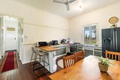 920 Tomki-Tatham Rd Tatham NSW 2471 $565,000 The owners have slashed the price for a quick sale. This charming high set Queenslander home built in the 1920's is position on a 1.94. ha allotment. As you step through the front door you are greeted by an inviting internal walls and hallway adorned traditional VJ walls, high ceilings and beautiful hardwood timber floors throughout. This traditional Queenslander is filled with light from the wide veranda perfect for the outdoor living and dining overlooking farm land. Just 15 min to Lismore, 12 min to Casino, 30 minutes away from the beach(Evans Head) you will enjoy lovely sea breezes sailing through the home. Underneath the home offers ample space for parking, storage and double colourbond shed within a fully fenced house yard. - 3 queen size bedrooms all with ceiling fans, 1 with built-ins - Comfortable lounge room flows to the wide verandah facing northeast - Tidy country eat in kitchen with gas cooking - Large bathroom has a shower and a toilet, Internal laundry on the enclosed sunroom - Large double lock up shed, parking for 3 cars under the home - Fully fenced house yard, 3 x 5000 water tanks It’s hard not to fall in love with a Queenslander. This is the style of home where your heart is going to make this decision easy for you call Jenny 0428 699 807 - 3 queen size bedrooms all with ceiling fans, 1 with built-ins - Comfortable lounge room flows to the wide verandah facing northeast - Tidy country eat in kitchen with gas cooking - Large bathroom has a shower and a toilet, Internal laundry on the enclosed sunroom - Large double lock up shed, parking for 3 cars under the home - Fully fenced house yard, 3 x 5000 water tanks