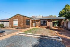 61 Shaw Street WEST LAMINGTON WA 6430 $449,000 Are you in the market for a brick family home that offers that extra internal space that is often so hard to find? Presenting 61 Shaw Street! This 4-Bedroom, 1.5-Bathroom property is going to tick the boxes for a range of buyers; whether it’s those families seeking a large home or a savvy investor wanting a property that’s located in a highly sought after location (& offers a VERY handy yield!). Offering a both a spacious, open-plan Kitchen/Living/Dining area AND a second Lounge/Games room; there won’t be any complaints about the amount of space here! Externally the property has an inviting decked Patio and ample yard space to make your mark on! • Four Well-Sized Bedrooms • 1.5 Bathrooms (One Main Bathroom/Ensuite & the Laundry has a Shower) • Open-Plan Kitchen/Living/Dining Area • Additional Games/Lounge Area • Freshly Painted • Inviting Decked Patio Area; Great for Entertaining • Ample Yard Space for Future Shed or Pool • Great West Lamington Neighbourhood (Close to North Kalgoorlie PS) • 898sqm Block Size