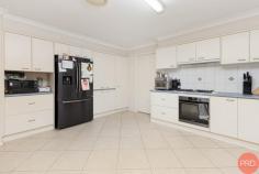 16 Brown Crescent Kurri Kurri NSW 2327 $785,000-$835,000 Discover the quintessence of comfortable living at 16 Brown Crescent, Kurri Kurri, a captivating residence ideally suited for first home buyers, investors and growing families alike. This splendid four-bedroom home, nestled in a serene crescent, promises an enviable lifestyle in the heart of a vibrant community. Boasting an impressive brick facade set amidst manicured gardens, the property provides a warm welcome to all who approach. Inside, the home reveals an open-planned kitchen, living and dining area that forms the heart of the house - a space designed for entertaining and relaxation. The flooring, a tasteful mix of tile and carpet, complements the luxurious finishes found throughout, while ducted air-conditioning ensures year-round comfort. The kitchen is a chef's dream, with sleek laminate benchtops, copious storage, gas cooking, a pantry and high-end appliances. Three generously proportioned bedrooms feature plush carpeting and built-in robes, while the master bedroom is an oasis of tranquillity, offering a voluminous walk-in robe and a sophisticated ensuite. The property's appeal extends outdoors to an expansive entertainment area, perfect for alfresco dining or simply enjoying the tranquillity of the locale. A substantial solar system promises energy efficiency, while the large garage, complete with internal access, and an additional carport with side access, ensure ample parking for vehicles. Situated on a 605 square metre plot, this beautiful house is just moments from local shops, transport links, pubs and the Kurri Kurri Hospital. The local golf course beckons for leisurely weekends, and the M1 Hunter Expressway provides effortless connectivity to Maitland, Newcastle, Singleton and the delights of the Hunter Valley Vineyards. 16 Brown Crescent is more than a home - it's a foundation for a lifetime of memories. Don't miss the opportunity to lay down roots in this enchanting setting.