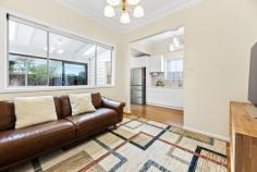 7 Hatton Grove Coburg VIC 3058 $1,180,000 - $1,280,000 Set in a quiet cul-de-sac and brimming with original character, this circa 1924 double-fronted Californian Bungalow offers a rare blend of heritage appeal and inner-city convenience. Proudly held by the same family for over 50 years, the home sits on a wide allotment just metres from the vibrant heart of Sydney Road's shops, cafés and trams. Freshly painted and immaculately presented, the home features manicured hedged gardens, soaring decorative ceilings with rosettes, polished Baltic pine floors, and a flexible layout comprising two generous bedrooms plus a study or optional third bedroom. Comfortable as is, yet offering outstanding potential to renovate or extend (STCA), the current floorplan includes a spacious lounge, separate dining room, gas-appointed kitchen, central bathroom and a sunroom that opens to a large, private backyard with a desirable northerly aspect. Additional highlights include gas heating, air conditioning, and a full side driveway leading to a double carport at the rear. Ideally located close to Coburg Lake, Merri Creek trails and market gardens, schools, John Fawkner Hospital, and just moments to trains and the CBD.