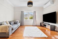 2/1154 Frankston-Flinders Road Somerville VIC 3912 $550,000 - $600,000 The perfect position where convenience meets community Radiating the classic charm of the fabulous 50s, this beautifully updated three-bedroom cottage gracefully caters to the demands of modern life. It effortlessly intertwines a touch of Art Deco elegance with a practical living experience, all nestled on the outskirts of Somerville's bustling retail centre. Tucked away in a three-lot subdivision without Body Corporate limitations, this charming home greets you with bright, sunlit interiors highlighted by the warm beauty of solid timber floors. A central hallway elegantly separates the living spaces from the entertaining areas, while the cozy crackle of an open fireplace beautifully defines the distinction between the living and dining zones. An updated kitchen with a freestanding dual-fuel cooker, dishwasher and feature circular sink ensures everyday cooking is effortless, while a rear main bathroom complements with a contemporary design. Three bedrooms, including the master, provide comfortable accommodation for family or guests, while additional features include sun-drenched deck and covered verandah, a dedicated laundry, reverse-cycle heating and cooling throughout, solar power, a rear garden shed, and two parking bays. Set within an easy walk of Somerville Plaza, Vesbar, Somerville Recreational Reserve, and Somerville Train Station.