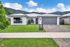 14 Creekview Parade Bentley Park QLD 4869 $749,000 In a privileged position in popular location of Cairns, in Cherrybrook Estate, Therese Plath welcomes your interest in this beautifully presented home positioned on a 645m2 block only 16kms from Cairns City Centre. This suburb is home to Southern Growth corridor and a short stroll to local park and playground and within minutes to day care centres, primary schools, state and private, shopping centres, doctors and sporting. The needs of the modern family are exceeded by such outstanding inclusions as a sleek designer kitchen, four bedrooms and two bathrooms. The home flows from its welcoming entry to a spacious open-plan living, dining and kitchen, opening onto the tropical outdoor living. This custom designed and master built home offers a harmonious blend of contemporary style and everyday comfort. Neutral tones and open-plan interiors create a serene and inviting atmosphere from the moment you step inside. The heart of the home is a light-filled open-plan living, dining, and kitchen area that flows effortlessly onto a tiled alfresco space-ideal for year-round entertaining. The designer kitchen is a showstopper, complete with a breakfast bar, walk-in pantry, quality appliances including a gas cooktop, electric oven, dishwasher, and abundant bench and storage space to inspire the home chef. Tucked away from the main living area, a separate carpeted media room offers the ultimate retreat for indulgent relaxation-perfect for lazy Sundays. The open-plan design fills with natural sunlight through large glass sliding doors leading onto the tiled patio offering a seamless transition to outdoor entertaining all year round whilst you watch the kids and pets play on the lush lawn. The spacious master retreat is located at the front of the home and comes complete with en-suite and walk in robe whilst the other three bedrooms are conveniently located to the main bathroom. The expansive backyard provides plenty of room for children and pets to play, with potential to add a pool if desired. Showcasing a contemporary design and impeccable attention-to-detail, the property includes: tiled living and bedrooms air conditioned and security screened throughout media room or could be fifth bedroom internal laundry extra long and wide double remote garage with internal access (big enough for large 4x4) fully fenced to rear - safe for children and pets to play safely Perfect for investors and owner occupiers picturesque mountain backdrop aspect