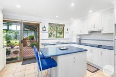 231 Sandy Point Road Salamander Bay NSW 2317 $1,075,000 Perfectly positioned in sought-after Salamander Bay, this charming brick home sits on a flat, level 1235m2 block and offers the ultimate in coastal living in a very private setting. Just moments from local schools, Salamander Bay Shopping Centre, and the stunning beaches of Port Stephens, you'll be spoiled for choice when it comes to convenience and lifestyle. Designed for effortless entertaining and complete privacy, the home features a generous backyard and a seamless indoor-outdoor flow. The covered alfresco area, complete with a built-in BBQ, extends from the main living space, ideal for year-round gatherings with family and friends. At the heart of the home, the immaculate kitchen boasts crisp white cabinetry, striking blue benchtops, and a central island bench. Equipped with an electric cooktop, oven, dishwasher, and ample storage, it overlooks the outdoor entertaining area through large windows and sliding doors, filling the space with natural light. The tiled open-plan dining living and carpeted lounge area offers air-conditioning for comfort, creating a welcoming space to relax. The home offers three well-sized bedrooms, all with plush carpeting. The master suite features full length mirrored built-in wardrobe and an oversized ensuite. The additional two bedrooms include ceiling fans and built in robes. Also offering a double lock up garage with internal access, sprinkler system with a spear pump, garden sheds and many other features on offer. With its unbeatable location, generous living space, and fantastic entertaining area, this home is a rare find and offers the perfect blend of convenience, comfort, and coastal charm not to be missed!