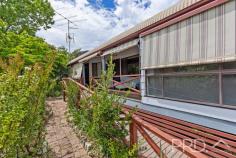 31 Pether Street Talbingo NSW 2720 $490,000 Centrally positioned in the heart of picturesque Talbingo and offering a free flowing and diverse floor plan. You will love the space afforded in this three-bedroom, plus study family home. With three great sized bedrooms, sun filtered and free flowing living areas with the kitchen positioned in the heart of the home and additional detached studio/rumpus. 31 Pether Street is an opportunity not to be missed. Call today to book your private inspection! Premiere Features: - Three great sized bedrooms positioned privately throughout the home, two with ceiling fans and master boasting direct external deck access - Centrally located and privately positioned bathroom with single vanity, wall hung shaving cabinet, shower and toilet - Great size kitchen in the heart of the home with electric cooktop, ample cabinetry and good bench space - Large front living with ceiling fan, reverse cycle air conditioning and direct access to the front deck - Open plan dining area directly off kitchen and used as separation between the two living areas - Second living area to the rear of the plan with large picture window overlooking the rear yard - Good sized internal laundry - Additional internal second separate toilet - Additional sunroom privately accessed from the front deck under cover and with its very own viewing deck - Two times built in linen options within the toilet and laundry areas - Fully fenced and landscaped rear yard - Three car, secure carport, also acting as covered outdoor entertaining area, with lighting and power - Additional covered entertaining area outside of the workshop and Studio/rumpus area's - Great size workshop area with light, power and roller door - Detached studio/rumpus area with reverse cycle air conditioning - Fully fenced yards - Approximate 710m² allotment in the heart of Talbingo Do not miss your opportunity to secure this free flowing and versatile family home in the heart of Talbingo.