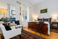 57 Govetts Leap Road Blackheath NSW 2785 $900,000 - $990,000 'Holly Cottage' circa 1900 is an elegantly renovated turn of the century property with fireplaces in every room and gracious proportions. A warm and welcoming interior has been sympathetically curated in line with this home's retained period features: 12ft high ceilings, NZ Kauri Pine floors and timber lined walls ensure that this home tugs at your heart strings from the moment of entry. A sunroom bathed in natural light offers a tranquil reading spot, the bedrooms have a heartwarming ambience and the central living room, with its powerful slow combustion real wood fire, says "Ahhh , at last, I'm home". Every metre of this property has been used to its best advantage and seeing is believing. From the kitchen, dining area there is access to a spacious mudroom and full bathroom with internal laundry. A level garden grants rear access and off street parking for two vehicles if desired. Here is where you will also find a stylish mini mobile home that is ideal for visiting guests who can enjoy their own slice of mountain privacy. If you play your cards right, this could very well be the turn-key residence that you did not even know you were looking for. Those with a keen interest should add this one to their priority viewing list without delay. Breakdown of Features: Mountain cottage less than a 300 metre stroll from village cafes, shops and amenities Stylishly curated interiors with 12ft high ceilings; timber lined walls and NZ Kauri pine floors Two queen bedrooms with original fireplaces & seating areas; ducted gas wall heater in 2nd Central living room with slow combustion real wood fire; internal hallway doors Light-filled galley-style kitchen with gas cooking and dining area with skylight Spacious mud room to rear and bathroom with internal laundry and storage; instant hot water Level garden with rear access and off-street parking for two vehicles Mini-mobile home with private seating area perfect for visiting friends and family