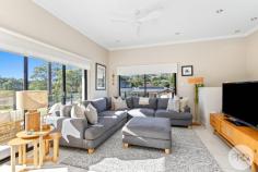 157 Bagnall Beach Road Corlette NSW 2315 Positioned in the highly sought-after suburb of Corlette, and approx. a 150m stroll from the beautiful water's edge of Bagnall Beach, this stylish and low-maintenance home offers the perfect blend of comfort, convenience, and coastal charm. Spread across two levels, the immaculate home features three bedrooms of accommodation, two bathrooms, and secure parking for two vehicles. On the entry level, you'll find two well-sized bedrooms, both with built-in wardrobes and split system air conditioning for year-round comfort. The main bathroom on this level is beautifully finished with floor-to-ceiling tiles in a modern white and grey palette, featuring a sleek vanity, shower, bath, and toilet. There's also a spacious laundry, which opens out to a private courtyard with low-maintenance landscaping. On the upper-level, natural light floods the generous living area through large windows and sliding doors that lead to a wrap-around balcony, perfect for entertaining or enjoying the sea breeze. The stunning kitchen is well-equipped with an electric cooktop, oven, dishwasher, white cabinetry, and stone benchtops, all complemented by a stylish blue feature tile splashback. The master bedroom is generously sized with built-in wardrobes, plush new grey carpet, and a private ensuite. It also enjoys direct access to the balcony through sliding doors, creating a seamless indoor-outdoor flow and the perfect spot to enjoy your morning coffee. This level also includes access to a second tiled courtyard, adding to the home's appeal and functionality for entertaining. With Dutchman's Beach, Anchorage Port Stephens, local cafes, schools, and shopping all nearby, this home presents an ideal opportunity for those seeking a relaxed beachside lifestyle or a fantastic investment in the heart of Port Stephens.