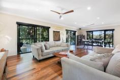 16 / 463 Trees Road Tallebudgera QLD 4228 $1,795,000 Immersed within a lush and leafy natural canopy, this award-winning home is a truly tranquil Tallebudgera oasis. Part of an exclusive gated estate and sprawled across a 3391m2 block, it's serene, sophisticated and spacious – with the added allure of fully self-contained dual living. Designed with a strong connection to the lush landscape, you'll feel instantly at one with nature. From the vast decking that embraces the entire residence to the expansive use of glazing throughout, the greenery is only ever a glance away. Just as impressive is the seamless flow between the open-plan kitchen, living, and dining area and outdoors. After you've cook up a feast with premium appliances, large scale slider doors lead onto the wraparound deck, creating a perfect place for family meals, entertaining friends or simply savouring the serenity. Three bedrooms and two stylish bathrooms also grace the top floor. In the master suite, gaze out at the bushland beauty from the cosy sitting area or contemporary ensuite, soaking away the day in the freestanding bath. Downstairs expertly caters to multi-generational living or an additional revenue stream to offset your mortgage. Privately accessed, the stylish dual living area boasts a kitchen with gas cooking, living/dining area, bedroom with a walk-in robe and combined bathroom/laundry and opens to a spacious alfresco deck. Situated in an exclusive gated estate, take advantage of being a short drive from shops, cafes and schools, and just 15 minutes from the sand and surf of Currumbin. Vibrant Burleigh, where you can indulge in local beaches, restaurants and boutique shopping, is 16 minutes from home, with frequent flyers able to access Gold Coast Airport in 20 minutes (approx.). Harmonising space, style, and serenity, you won't want to miss this one – arrange your inspection today! House Features: Serene, sophisticated and spacious award-winning residence immersed within a lush bushland canopy Spans two levels, designed for fully self-contained dual living Vast decking wraps around the whole home, capturing mesmerising bushland vistas Elegant and expansive open plan kitchen, living and dining zone with a seamless connection to the outdoors Stylish kitchen with a waterfall-edge stone island bench, gas cooktop, Miele dishwasher Master suite with cosy sitting area, walk-in robe and a modern ensuite with floating vanity, large triple shower, concealed cistern toilet and freestanding bath gazing out at the greenery Bedroom with a built-in robe and external access Bedroom with lockable storage plus a built-in robe and desk Main bathroom features a shower, vanity and toilet Ceiling fans and air-conditioning Large workshop/storeroom Laundry Spacious 4-car carport Dual Living Features: Privately accessed Kitchen with gas cooktop Light, bright living/dining zone Bedroom with walk-in robe Combined bathroom/laundry Spacious wraparound alfresco deck Property Features: Secluded, lush and leafy 3391m2 block in a gated estate Former HIA Best Housing winner for the “Best Use of Steel” Fire hydrant 30,000L water tank Location: Approx. 5 mins to Tallebudgera State School and shops Approx. 7 mins to St. Andrew's Lutheran College Approx. 7 mins to Coplicks Tallebudgera Golf Course Approx. 8 mins to Meadow Park Golf Course Approx. 8 mins to Tally Valley Golf Course Approx. 11 mins to The Pines, Elanora Approx. 14 mins to Palm Beach Approx. 15 mins to Currumbin Beach Approx. 16 mins to Burleigh Heads Approx. 20 mins to Gold Coast Airport Approx. 28 mins to Kingscliff Beach Approx. 33 mins to Surfers Paradise