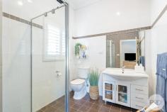 157 Bagnall Beach Road Corlette NSW 2315 Positioned in the highly sought-after suburb of Corlette, and approx. a 150m stroll from the beautiful water's edge of Bagnall Beach, this stylish and low-maintenance home offers the perfect blend of comfort, convenience, and coastal charm. Spread across two levels, the immaculate home features three bedrooms of accommodation, two bathrooms, and secure parking for two vehicles. On the entry level, you'll find two well-sized bedrooms, both with built-in wardrobes and split system air conditioning for year-round comfort. The main bathroom on this level is beautifully finished with floor-to-ceiling tiles in a modern white and grey palette, featuring a sleek vanity, shower, bath, and toilet. There's also a spacious laundry, which opens out to a private courtyard with low-maintenance landscaping. On the upper-level, natural light floods the generous living area through large windows and sliding doors that lead to a wrap-around balcony, perfect for entertaining or enjoying the sea breeze. The stunning kitchen is well-equipped with an electric cooktop, oven, dishwasher, white cabinetry, and stone benchtops, all complemented by a stylish blue feature tile splashback. The master bedroom is generously sized with built-in wardrobes, plush new grey carpet, and a private ensuite. It also enjoys direct access to the balcony through sliding doors, creating a seamless indoor-outdoor flow and the perfect spot to enjoy your morning coffee. This level also includes access to a second tiled courtyard, adding to the home's appeal and functionality for entertaining. With Dutchman's Beach, Anchorage Port Stephens, local cafes, schools, and shopping all nearby, this home presents an ideal opportunity for those seeking a relaxed beachside lifestyle or a fantastic investment in the heart of Port Stephens.