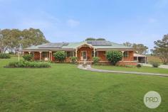 126-134 Bylong Road Tamworth NSW 2340 $1,300,000 - $1,400,000 If you've been searching for a home that blends timeless charm with room for the whole family, this spacious property ticks all the boxes. From the moment you step inside, you're greeted with high ceilings throughout, and a formal lounge adorned with stylish cornices and decorative ceiling rosettes, offering a warm and elegant welcome. Privately set to one end of the home are four generous bedrooms, each with built-in robes, serviced by a spacious main bathroom with a separate toilet for added convenience. The master bedroom is located separately and offers great privacy, complete with its own ensuite and built in robe. The heart of the home is the charming emerald green kitchen, boasting a walk-in pantry and views over the open-plan living and dining area - perfect for everyday living and entertaining. A real standout is the sunken games room, bathed in natural light from large windows, offering a versatile space for relaxing or hosting guests. A full-size snooker table currently takes pride of place it is not included in the sale however can be negotiated as part of the sale if desired. Functionality continues with a well-appointed laundry that opens directly to the pool area and includes two double storage cupboards. Outside, the property truly shines with infrastructure to suit the hobbyist or tradesperson: A three bay shed with an adjoining men's workshop An additional two-bay carport extension A separate shed designed to house a caravan, float, or trailer The property is fitted with a 7.7kw solar system with 18 panels, its own private bore servicing the taps in the house yard taps along with this there is also 2 x 5,000ltr concrete tanks and a 7,000ltr poly tank. This is a home that offers lifestyle, space, and style in a peaceful setting all whilst being in town - a rare opportunity in the Tamworth market.