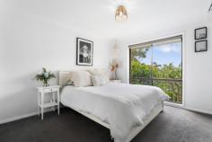 35 Sheridan Crescent Stanwell Park NSW 2508 Positioned on a quiet street in the peaceful village of Stanwell Park, this partially renovated family home provides you with everything you could want from coastal living. YOUR HOME • The house has undergone some recent renovations with the floorplan opened up, fresh carpet and painting, along with a new kitchen with stone benchtops. You can move in and live comfortably or continue the renovations through the rest of the home to add your own style and taste. • On the lower level of the home you will find a large rumpus room with fireplace. It's ideal for use as a kids play area, hobby room, art studio or 4th bedroom as the adjacent laundry doubles as a full bathroom. • Every square metre of the property has been cleverly utilised. The front yard is terraced, grassed and fenced, providing additional yard space. The rear is much the same with a spacious entertaining deck overlooked by another private yard space with ocean views, an ideal area to retreat to the firepit after enjoying lunch/dinner with family and friends. • As the home is elevated on the high side of the street, you are provided with ample peace, privacy and views of the surrounding mountain as well as the ocean. • The front entertaining deck overlooks your grassed yard, allowing you to watch the children play while you prepare dinner or entertain friends. • Other features include a secure double garage with internal access, outdoor shower complete with hot water for when you get back from the beach, reverse cycle aircon to keep you comfortable year-round, built-in wardrobes in all upstairs bedrooms as well as quality security cameras at the front and rear for additional peace of mind. LOCATION • One of Stanwell Park's most family friendly streets, being a quiet cul de sac with very little traffic and plenty of friendly long term residents. • Only a moment's stroll to the pristine Stanwell Park beach which is fully patrolled, offers fantastic surf breaks and is dog friendly. • You can leave the car at home as the local cafes, school, shops and restaurants are all only minutes from your front door. • The Royal National Park is situated just 10 minutes drive. • Stanwell Park is located approximately 1 hour South of Sydney CBD and approximately 30 minutes North of Wollongong CBD. • Embrace the quintessential coastal lifestyle and all that comes with it... swimming, fishing, bushwalking, hang gliding and family picnics in popular parklands all available only moments from your doorstep.