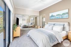 157 Bagnall Beach Road Corlette NSW 2315 Positioned in the highly sought-after suburb of Corlette, and approx. a 150m stroll from the beautiful water's edge of Bagnall Beach, this stylish and low-maintenance home offers the perfect blend of comfort, convenience, and coastal charm. Spread across two levels, the immaculate home features three bedrooms of accommodation, two bathrooms, and secure parking for two vehicles. On the entry level, you'll find two well-sized bedrooms, both with built-in wardrobes and split system air conditioning for year-round comfort. The main bathroom on this level is beautifully finished with floor-to-ceiling tiles in a modern white and grey palette, featuring a sleek vanity, shower, bath, and toilet. There's also a spacious laundry, which opens out to a private courtyard with low-maintenance landscaping. On the upper-level, natural light floods the generous living area through large windows and sliding doors that lead to a wrap-around balcony, perfect for entertaining or enjoying the sea breeze. The stunning kitchen is well-equipped with an electric cooktop, oven, dishwasher, white cabinetry, and stone benchtops, all complemented by a stylish blue feature tile splashback. The master bedroom is generously sized with built-in wardrobes, plush new grey carpet, and a private ensuite. It also enjoys direct access to the balcony through sliding doors, creating a seamless indoor-outdoor flow and the perfect spot to enjoy your morning coffee. This level also includes access to a second tiled courtyard, adding to the home's appeal and functionality for entertaining. With Dutchman's Beach, Anchorage Port Stephens, local cafes, schools, and shopping all nearby, this home presents an ideal opportunity for those seeking a relaxed beachside lifestyle or a fantastic investment in the heart of Port Stephens.