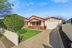 6 Waterhouse Rd South Plympton SA 5038 $875,000 to $910,000 From its classic façade complete with picket fence to gorgeous upgrades throughout, this 1925-built Bungalow maisonette is character meets contemporary in the very best way. Polished timber floorboards, original fretwork and sky-high ceilings line the entry, where both bedrooms are easily accessible, the master offering mirrored robes and a northerly-aspect outlook via big windows to the front yard. Upgraded with full-height tiling, shower over bath and pedestal vanity, the bathroom is just down the hall, with convenient separate toilet. Centrally positioned, a cosy formal lounge room enjoys a ceiling fan, split system air conditioner and ornamental open fireplace with mantle. Open, airy and renovated, the modern kitchen and meals space will delight cooks of the home with a gas cooktop, glass splashback, dishwasher, twin-door pantry, plenty of storage and a breakfast bar. Colonial-style French doors open onto a brilliant rear alfresco space, where a curved roof pergola with ceiling fan adds protection while still allowing natural light, and the outdoor kitchen with gas connection is ready for making year-round entertaining a piece of cake, all with the established and easy-care rear garden as your backdrop. More you'll adore: - Separate renovated laundry - Timber venetian blinds - Ceiling fan + ornamental fireplace to bedroom 2 - Remote lockable carport + off-street parking with drive-through access to rear garage - Raised garden beds with westerly aspect along driveway - Ducted evaporative cooling + gas heating - Close proximity to Emmaus Christian College You'll love the location, where local shops, cafes and hotels, bus and train transport, The Crescent Reserve and Edwardstown Oval are all within walking distance, and Castle Plaza Shopping Centre is just a few minutes' drive. Close to CBD and the sea and presented to perfection, this one will have a high appeal; come and check it out for yourself.
