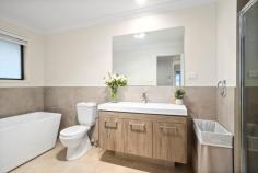 22 Tomerong Street Tullimbar NSW 2527 $1,280,000 - $1,330,000 Welcome to 22 Tomerong Street, Tullimbar - a spacious family haven designed for relaxed living, effortless entertaining and breathtaking escarpment views. Positioned on a level 497m² block, this impressive residence offers 5 oversized bedrooms, including a versatile ground-floor guest suite ideal for multi-generational living or visiting guests. With 3 modern bathrooms and multiple expansive living areas, there's plenty of room for the whole family to relax, play and entertain. At the heart of the home is the stylish kitchen, thoughtfully designed to capture uninterrupted views of the escarpment. Complete with a walk-in pantry, 900mm oven, and 5-burner gas cooktop, it's the perfect setting to prepare meals or host gatherings while soaking in the incredible outlook. Outside is a backyard oasis, where an outdoor spa and a large covered alfresco area set the scene for ultimate relaxation and effortless entertaining. The yard offers plenty of space for children and pets to play, all while enjoying the stunning escarpment backdrop. Whether it's unwinding after a busy day or sharing summer evenings with loved ones, this outdoor space is truly special. HIGHLIGHTS INCLUDE • 5 generous bedrooms • 3 bathrooms • Spa • Ducted air-conditioning • 6.6kw solar system • Multiple open-plan living areas • Kitchen overlooks the escarpment and has quality inclusions like walk in pantry, 900mm oven, 5 gas burner cooktop • Big driveway ideal for large families with multiple cars • Level 497m2 block with plenty of backyard for kids and pets to play • Peaceful escarpment views