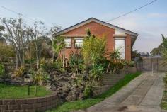 2 Ash Court Frankston North VIC 3200 $615,000 - $665,000 Located in one of the area's most exclusive cul-de-sacs, this three-bedroom home is a beacon of light-filled living, framed by the picturesque landscape of The Pines Flora and Fauna Reserve. Spanning an elevated 674sqm (approx.) block, it showcases professionally landscaped gardens that invite outdoor leisure and enjoyment. Greeted by an array of local wildlife, including echidnas and koalas from the rear reserve, this striking address harmoniously connects with its natural setting while offering a classic layout. It brings families together across two dedicated entertaining areas, separated by a central kitchen featuring all-original cabinetry, a combined oven/cooktop, and direct laundry access. Garden influences continue to permeate the interior, creating a serene atmosphere across three spacious bedrooms, while additional features include a main family bathroom with separate tub, gas ducted heating, evaporative cooling, and ceiling fans. Self-watering, low-maintenance, and environmentally friendly modern Australian rain garden with organic fruit trees link the home with a rear micro cabin and separate entertaining area with fireplace, highlighting the home's true indoor-outdoor living experience. With a rear northern orientation and convenient position only a short stroll from everyday conveniences, this impressive home sits within close proximity of Mahogany Rise and Aldercourt Primary Schools, Monterey Community Park, Carrum Downs Shopping Centre and Peninsula Link access.
