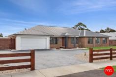 25 Blanchfield Drive Kyneton VIC 3444 $1,350,000 - $1,450,000 Set on a substantial allotment in a highly sought-after Kyneton location, this beautifully appointed residence delivers the perfect combination of modern style, functional design, and a lifestyle that embraces both indoor comfort and outdoor space. From the moment you step inside, the wide entry and light-filled interiors create an immediate sense of space, setting the tone for what's to come. The heart of the home is undoubtedly the expansive open plan kitchen, dining and living zone - designed with connection and comfort in mind. The living area flows effortlessly to the alfresco space, inviting year-round entertaining or easygoing afternoons with a good book and a glass of something local. The kitchen itself is a standout. At its centre, a generous stone-topped island offers the perfect perch for casual conversations or morning coffee rituals. Home cooks and entertainers alike will appreciate the quality appliances, plumbed fridge/freezer, soft-close cabinetry and abundant storage - all crafted for ease and style. The thoughtful layout means everything is within easy reach, whether you're cooking up a family feast or plating nibbles for guests. It's a kitchen that makes everyday tasks feel just a little more special. A thoughtful floor plan offers multiple living zones, including a formal lounge at the front and a versatile rumpus room, ideal for a kids' retreat or games space. Accommodation comprises 4 generous bedrooms, including a master suite with walk-in robe and private ensuite, while the remaining bedrooms are serviced by a stylish family bathroom. A dedicated study nook provides the perfect work-from-home solution. Outdoors, the property truly shines. Expansive lawns provide endless space for children, pets, and recreational activities, while the fire pit area offers a welcoming spot to gather on cooler evenings. The double garage, side access, and ample space for caravans or trailers further enhance practicality. Designed with modern efficiency in mind. Connected to town water, it features a powerful 33kW solar system complemented by three-phase power, ensuring reliable energy for the home and any additional needs. The all electric residence includes thoughtful upgrades such as electric ducted heating/cooling, induction cooking, a heat pump hot water system and energy-smart design that reduces running costs while maximising comfort. Located in a family-friendly pocket, just minutes from Kyneton's vibrant town centre, schools, parks, and V/Line services, this is a rare opportunity to secure a modern home on a large block without compromising on convenience. Key Features: • Four bedrooms plus study, two bathrooms, multiple living zones • Stylish kitchen with stone benchtops, large island, and walk-in pantry • Covered alfresco and fire pit entertaining area • Expansive block with side access, ideal for caravans, trailers, or sheds